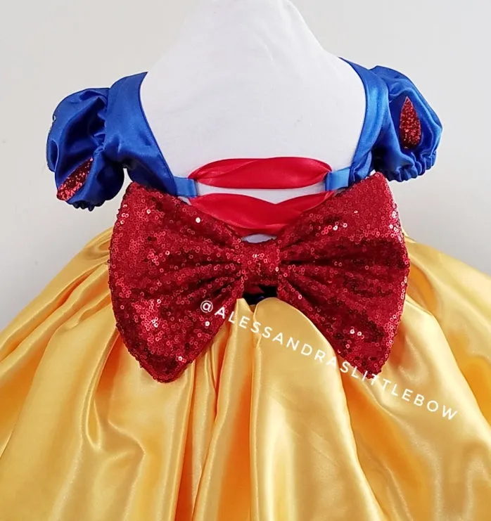 Add a bow to a dress/outfit