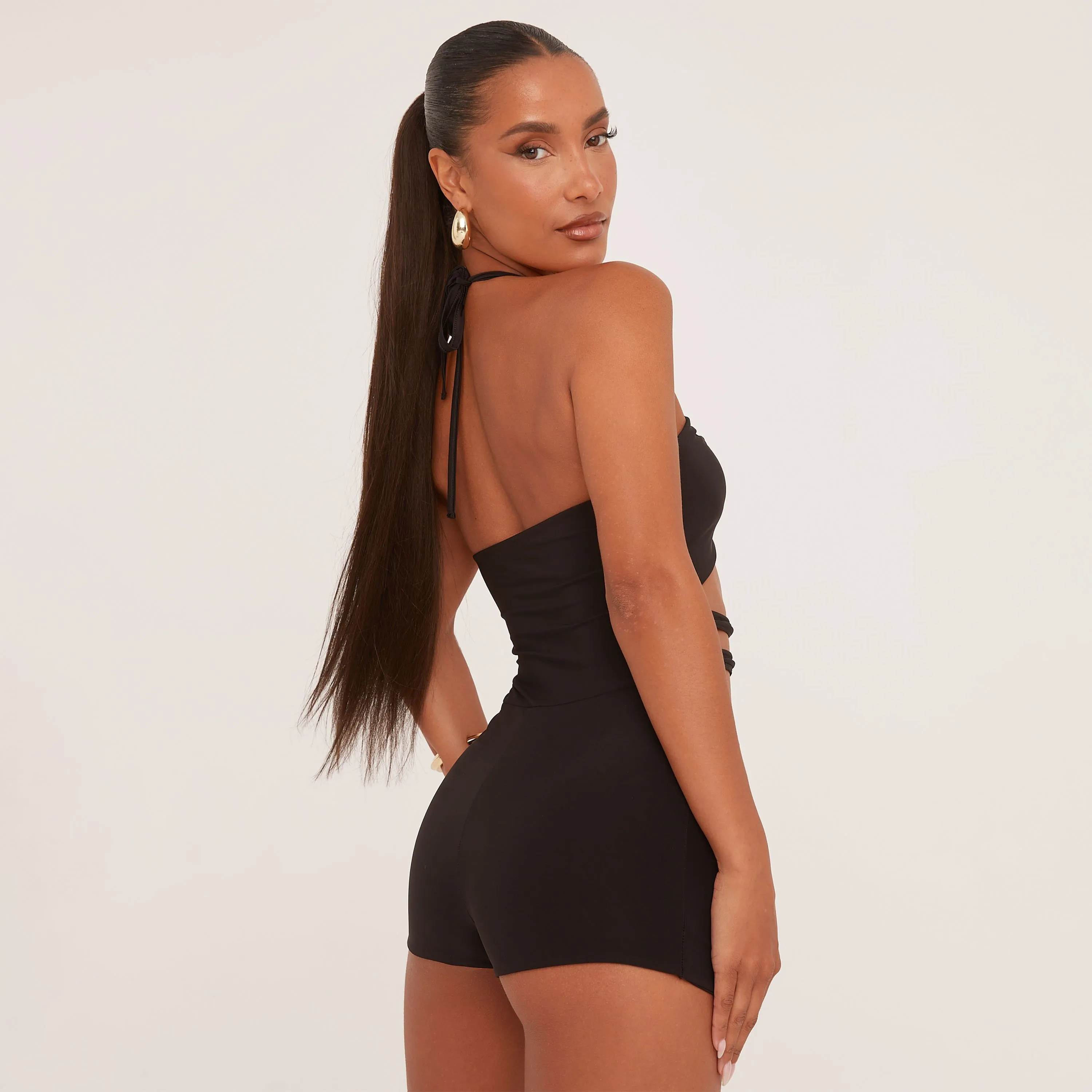 Halterneck Strappy Cut Out Playsuit In Black Slinky